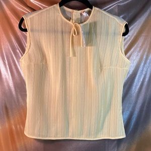 Vintage 1960’s nude sheer blouse with‎ button down back.  40” chest 203